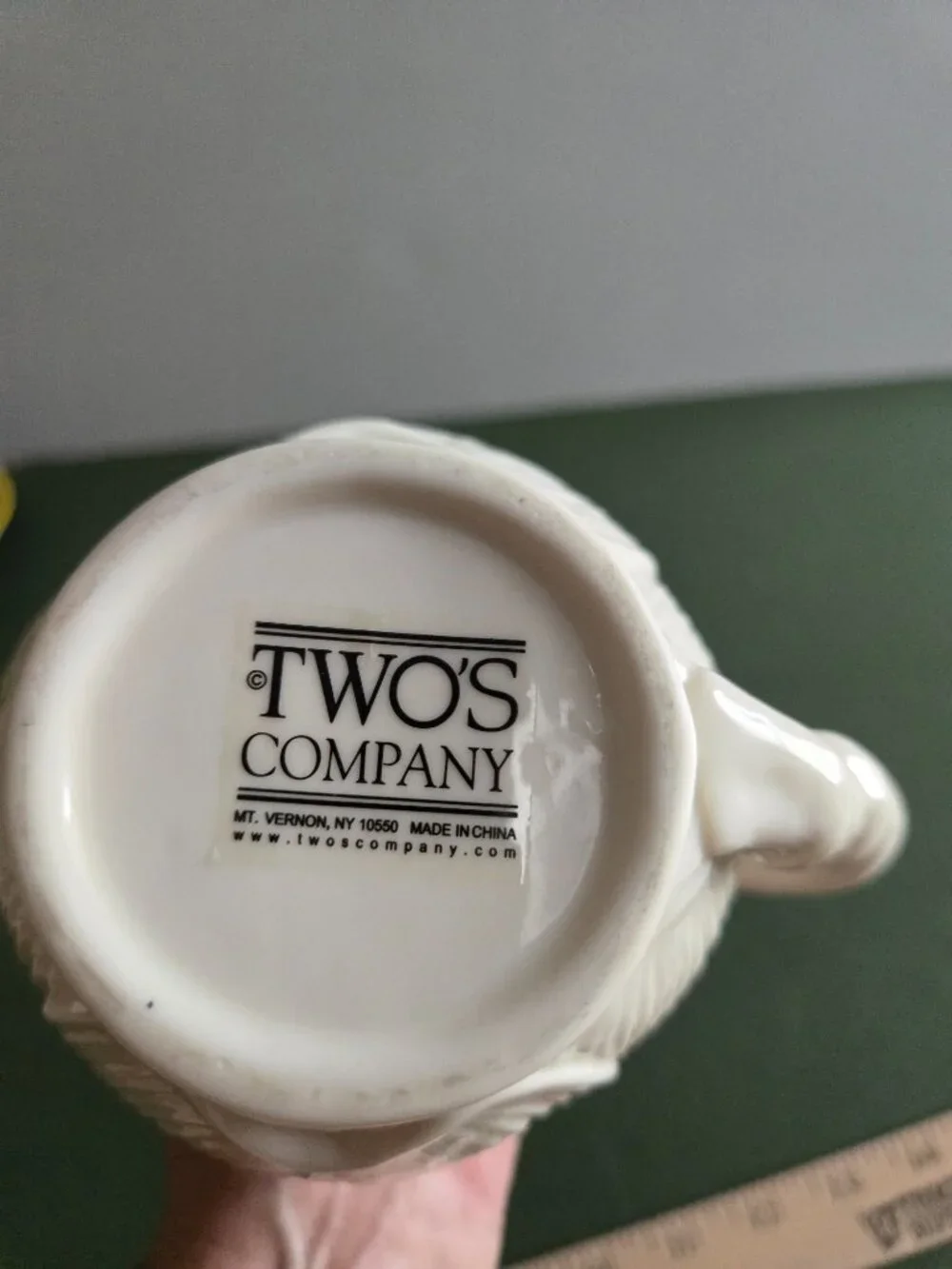 Pair of Ivory Bisque Pitchers